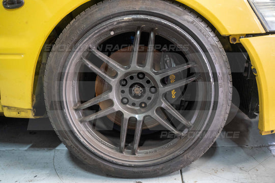 AME Tracer TM-02 18×9.5J +15 Gunmetal Alloy Wheels & Pirelli Tyres – Mitsubishi Evo 7–9 – Set of 4